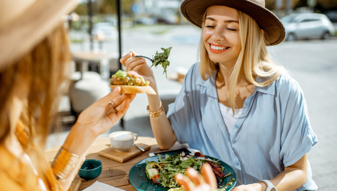 Friends have lunch in the spring